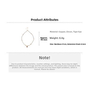 Detail of tiger's eye necklace with copper zircon chain and 41cm length specifications