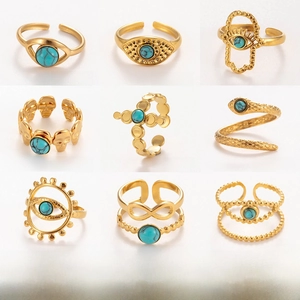 Adjustable stainless steel gold rings with natural turquoise stones in nine unique designs