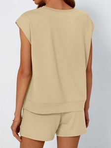 Rear view of women's sleeveless round neck two-piece lounge set in beige cotton knit