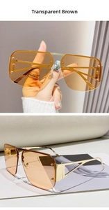 Detail of transparent brown aviator sunglasses with hollow geometric metal temples
