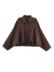 Detail view of dark brown suede bomber jacket with turn-down collar and lantern silhouette