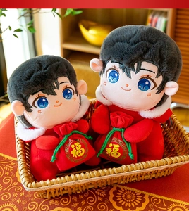 Detailed close-up of two cute mascot plush dolls wearing red festive outfits in a basket
