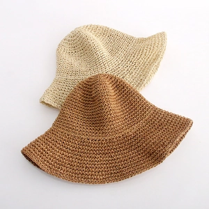 Handwoven wide brim straw sun hat for women in beige and coffee brown colors