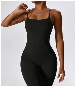 Detailed view of black slimming yoga jumpsuit with thin straps and square neckline design