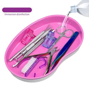 Pink heart-shaped disinfection tray set with stainless steel manicure tools and water splash