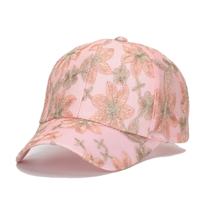 Pink baseball cap for women with elegant golden floral embroidery and curved brim