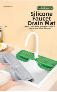 Detail of silicone faucet drainage mat with sloped grooves and integrated storage basket