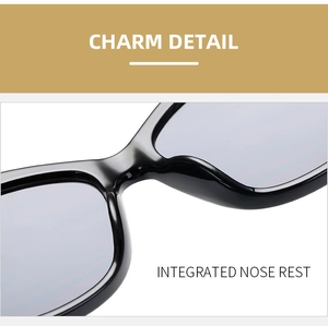 Detail showing the integrated nose rest of black oversized cat eye sunglasses