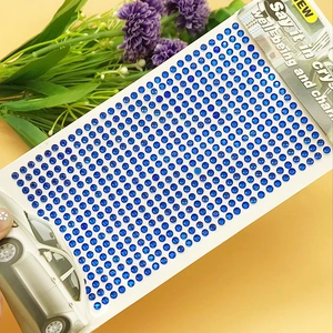 Close-up of blue 3mm acrylic crystal rhinestone stickers for DIY craft decoration