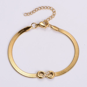 Gold stainless steel snake chain bracelet featuring a sparkling rhinestone infinity symbol