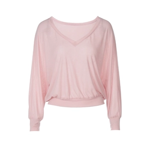 Detail view of the pink sheer fabric and knit texture on the long sleeve V-neck top