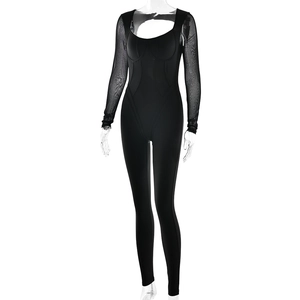 Detail of the black bodysuit with sheer mesh long sleeves and U-neck slim fit design