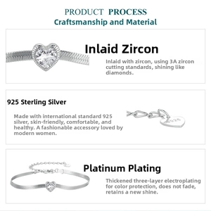 Detail view of heart-shaped zircon inlay and S925 sterling silver snake chain craftsmanship