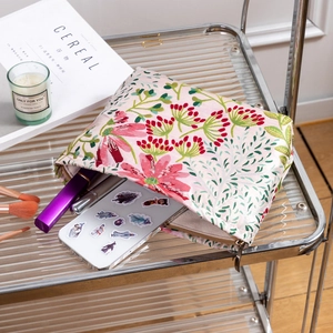 Floral makeup bag with large capacity and zipper, perfect for travel skincare storage