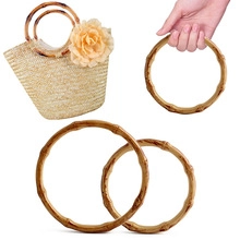 Pair of round bamboo handles for DIY bags with natural grain texture on white background
