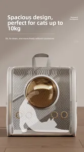 Close-up of portable pet carrier with transparent window and metal ventilation holes