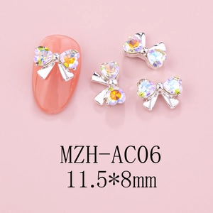 Bow heart nail art charm with iridescent rhinestones and 11.5x8mm size scale