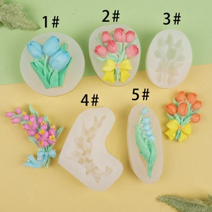 Macro detail of tulip and lily of the valley silicone molds with floral resin crafts