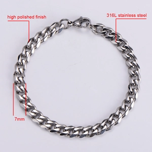 Macro detail of 7mm 316L stainless steel curb chain bracelet with high polished finish