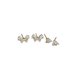 Elegant 4-piece gold-plated earring set with butterfly and heart shaped cubic zirconia