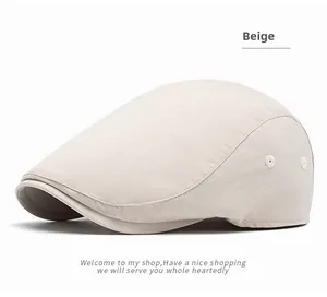 Detail view of beige striped beret hat with breathable side eyelets and textured fabric