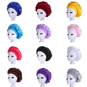 Elastic wide band satin sleep bonnets shown in 12 colors on white display mannequins