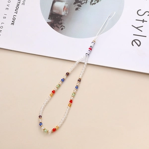 Detail of beaded phone strap featuring colorful crystal beads and LOVE letter charms