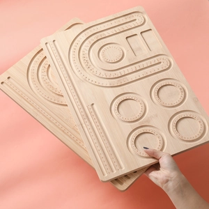 Wooden jewelry design board with engraved measuring scales and U-shaped beads grooves