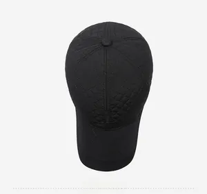 Top view of a black quilted baseball cap for men featuring classic diamond stitching