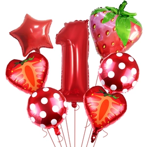 Detail of red strawberry theme balloon set with number 1 foil balloon for birthday decor