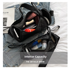 Detail of black quilted nylon cylinder bags showing high capacity for cosmetics and daily items