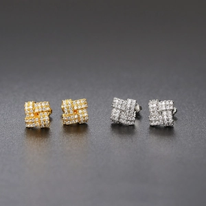 Square sugar cube earrings set in gold and silver with shimmering pave-set zircon stones