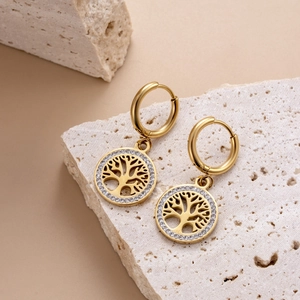 Golden Tree of Life hoop earrings with white zircon accents on white stone