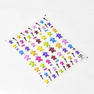 Autocollants 3D gaufrés pour ongles avec crânes colorés et motifs de cœur détaillés
