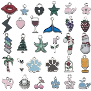 Detailed grid layout of twenty-four colorful enamel alloy charms for DIY jewelry making