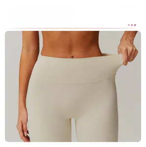 Detailed view of high-waist yoga leggings showing elastic fabric and tummy control fit