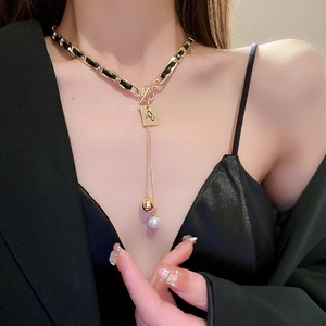 French style gold pearl Y-necklace featuring leather chain and rectangle pendant
