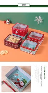 Detailed view of Christmas tin box with window lid and festive Joy to the World snowman print