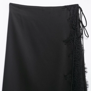 Elegant black satin midi skirt with lace trim and side tie detail for women