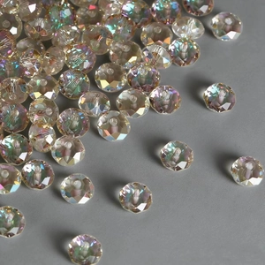 Macro shot of faceted crystal glass beads with AB aurora coating for DIY jewelry making