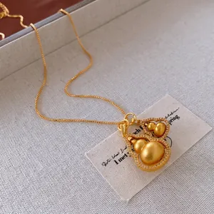 Gold-plated matte double gourd pendant necklace with sparkling zircon trim and box chain