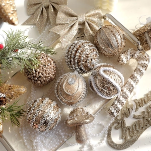Luxurious gold and silver Christmas ornament set with glitter balls, bows and stars