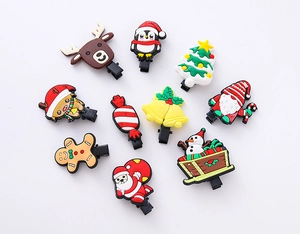 Set of 10 Christmas cartoon hair clips featuring Santa, reindeer, and snowman designs