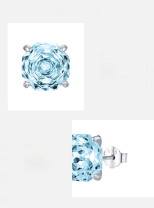 Detail of s925 silver stud earrings featuring square aquamarine-cut cubic zirconia