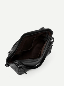Top view showing large capacity interior with zip pockets of black pebbled leather tote
