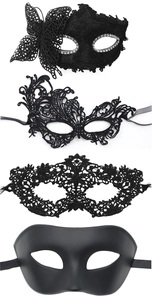 Detail showing four styles of black lace and matte masquerade masks for parties