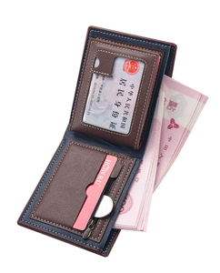 Detail view of the interior slots, zipper coin pocket, and bifold brown leather design