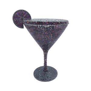 Detail of purple crystal martini glass clutch bag with lemon slice decoration