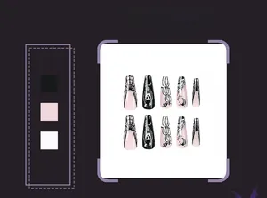 Detailed view of Halloween press-on nails with spider webs, skulls, and moon designs