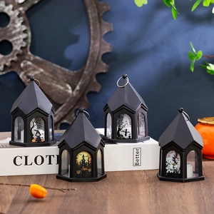 Lot de quatre lanternes d'Halloween noires avec bougies LED et motifs effrayants
